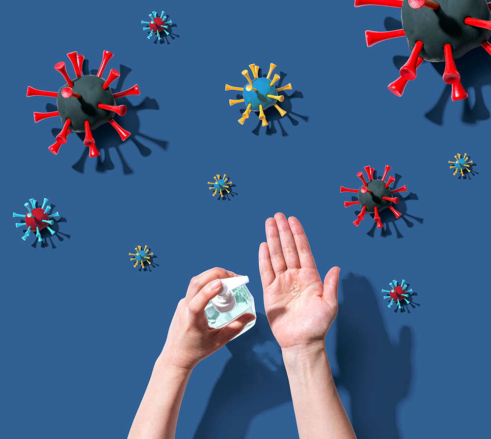 applying hand sanitizer